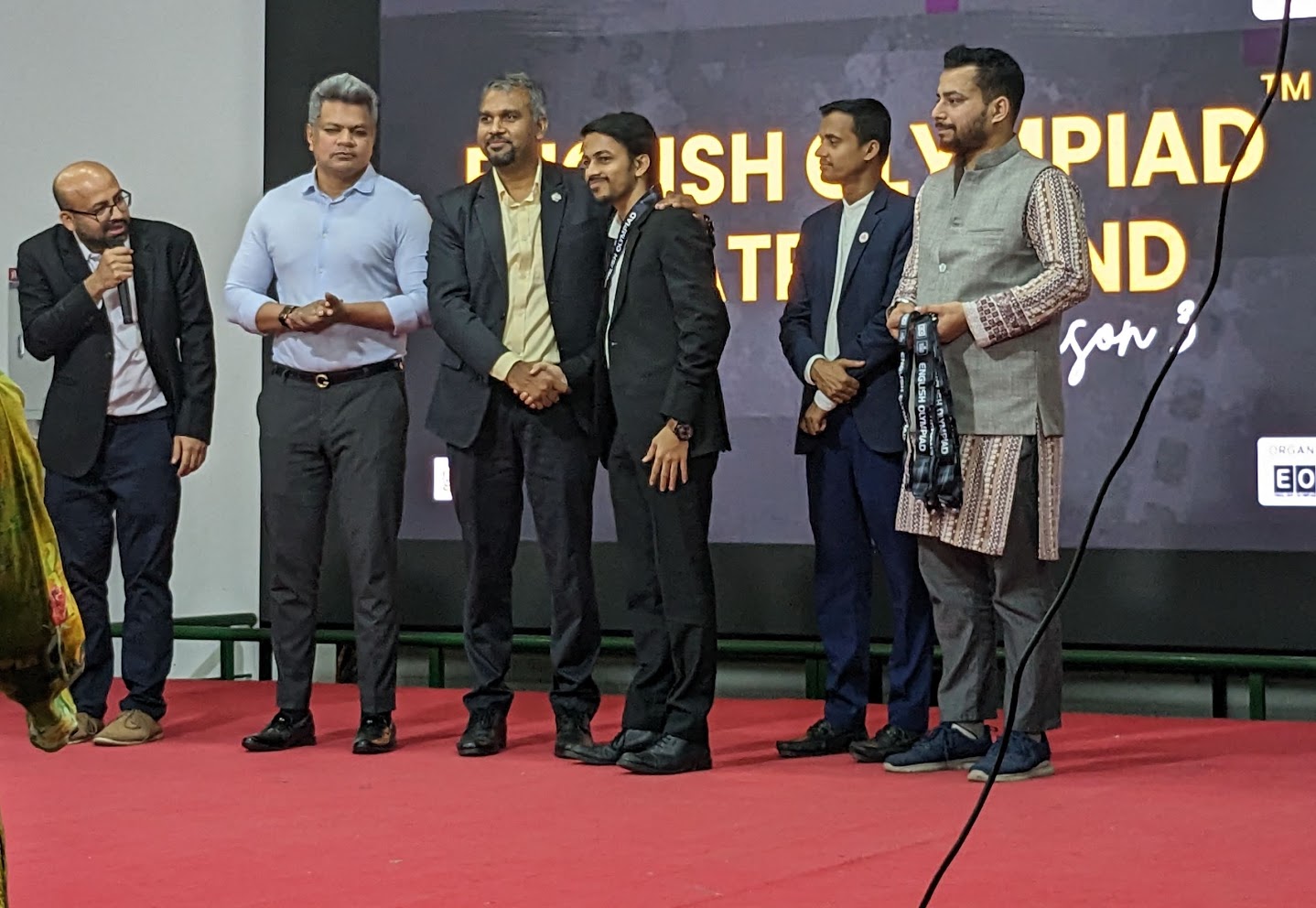 Miraz receiving recognition at an English Olympiad event on 27 January 2023