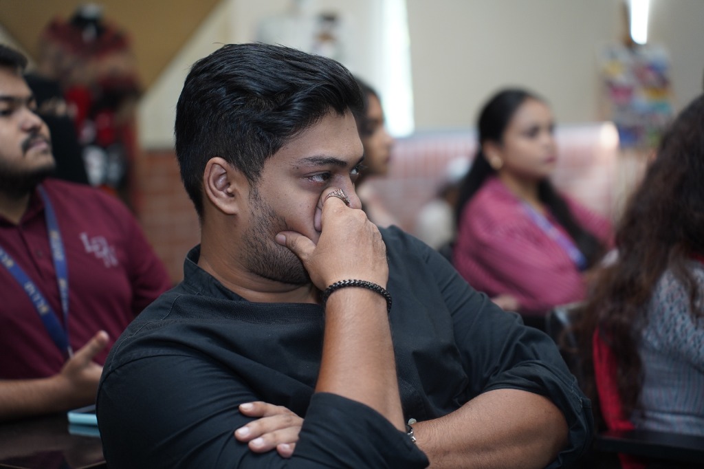 A student listening intently during the workshop